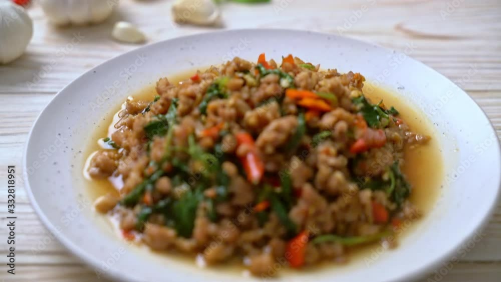 Stir fried Thai basil with minced pork and chilli - Thai local food style Stir fried Thai basil with minced pork and chilli - Thai local food style