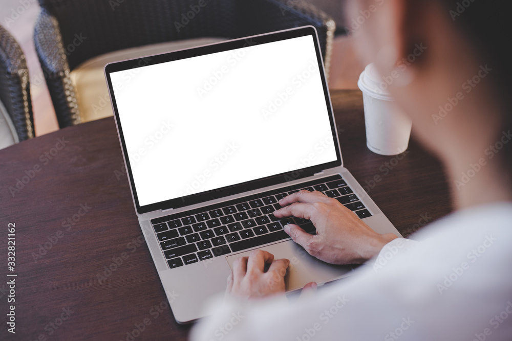 mockup image blank screen computer with white background for advertising text,hand woman using laptop contact business search information on desk at coffee shop.marketing and creative design mockup image blank screen computer with white background for advertising text,hand woman using laptop contact business search information on desk at coffee shop.marketing and creative design