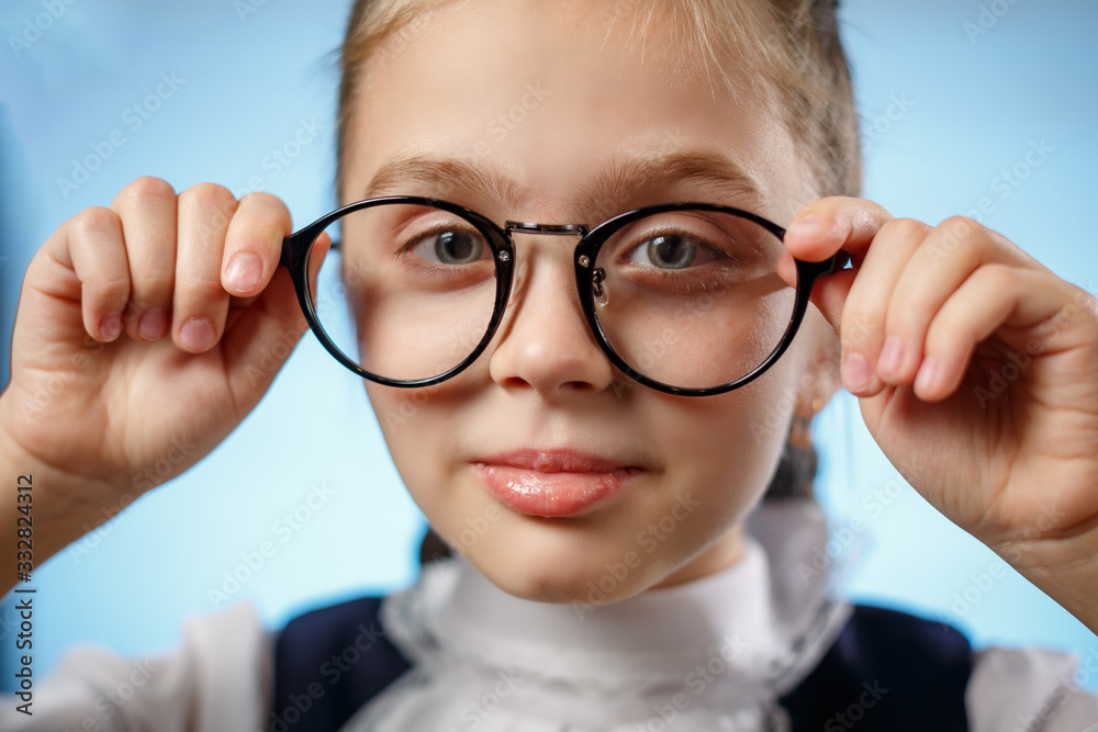 Pretty Primary Schoolgirl Try Glasses on Closeup Pretty Primary Schoolgirl Try Glasses on Closeup