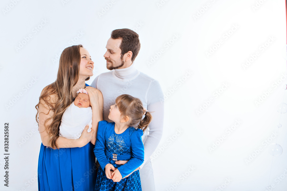 concept of healthy lifestyle, protection of children, shopping - baby in the arms of the mother and father. Woman and man holding a child. Isolated on white background. Copy space. Portrait of faamily