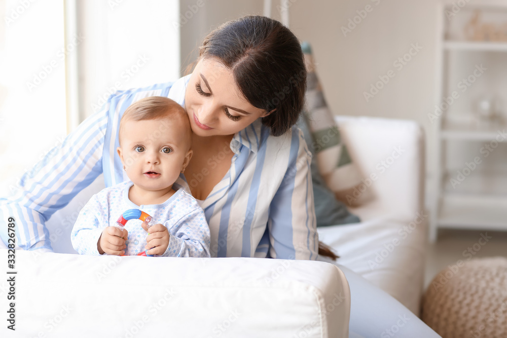Happy mother with cute little baby at home Happy mother with cute little baby at home