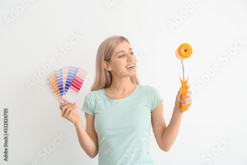 Young woman with color swat...