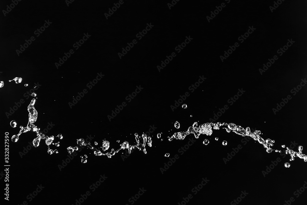 Splash of clean water on dark background
