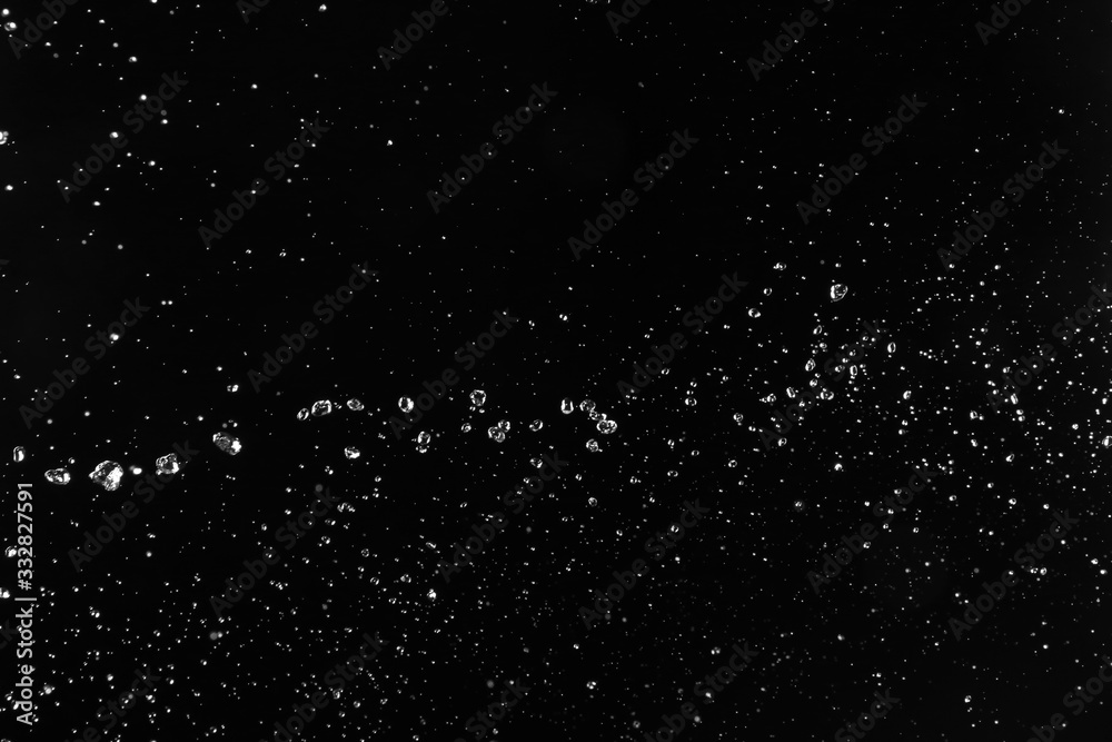 Splash of clean water on dark background