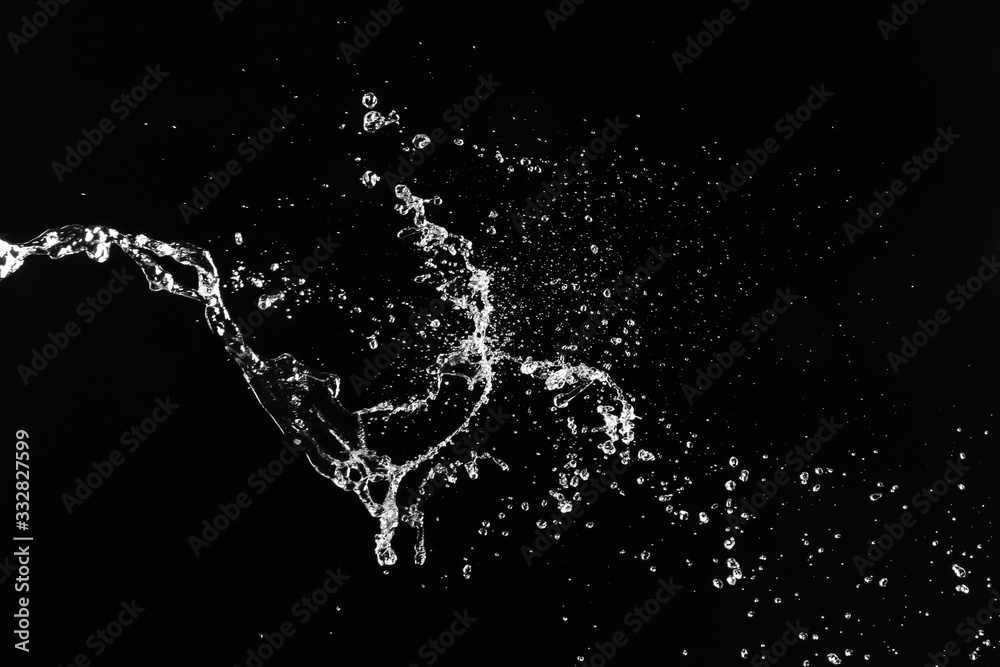 Splash of clean water on dark background