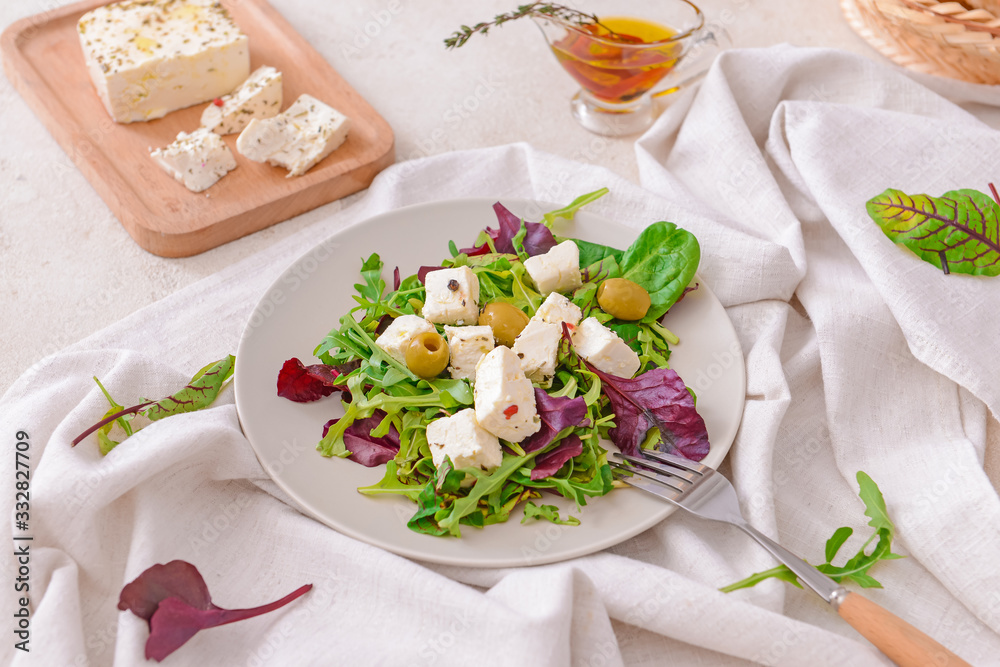 Tasty salad with feta cheese on table Tasty salad with feta cheese on table