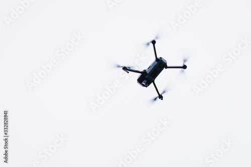 Drone flying over sky background