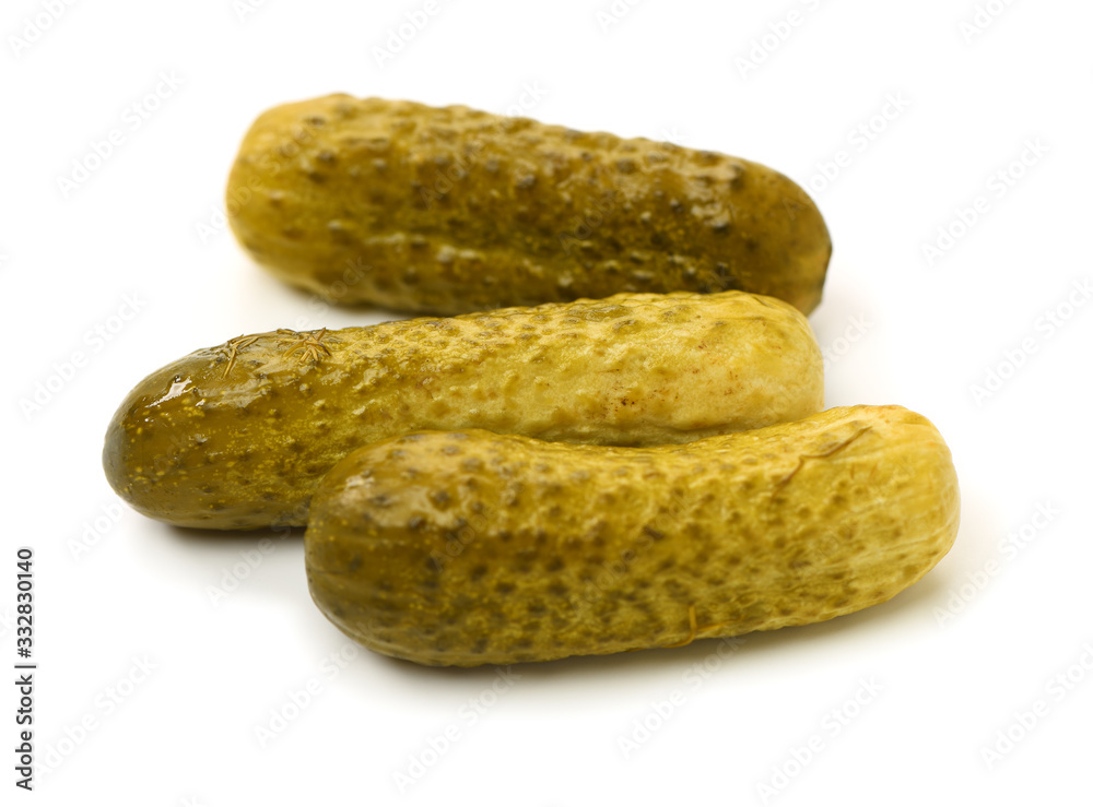 Marinated pickled cucumbers on white background Marinated pickled cucumbers on white background