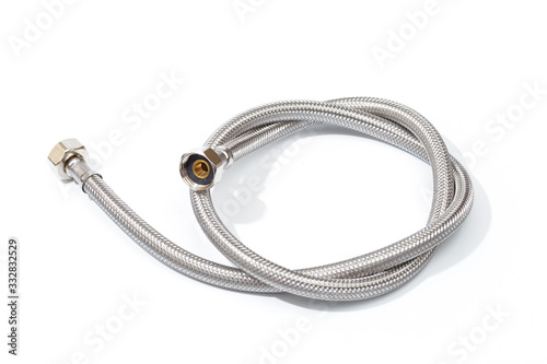 Chrome-plated corrugated hose for water isolated on white - Image