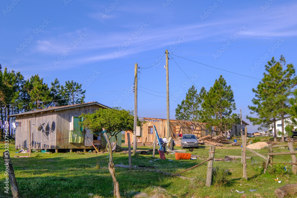 Traditional brazilian farm house of a fishing family, Lagoa Dos Patos near the Lagoa Do Peixe National Park, Brazil Traditional brazilian farm house of a fishing family, Lagoa Dos Patos near the Lagoa Do Peixe National Park, Brazil