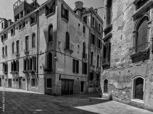 A quiet street in Venice  Italy in black and white