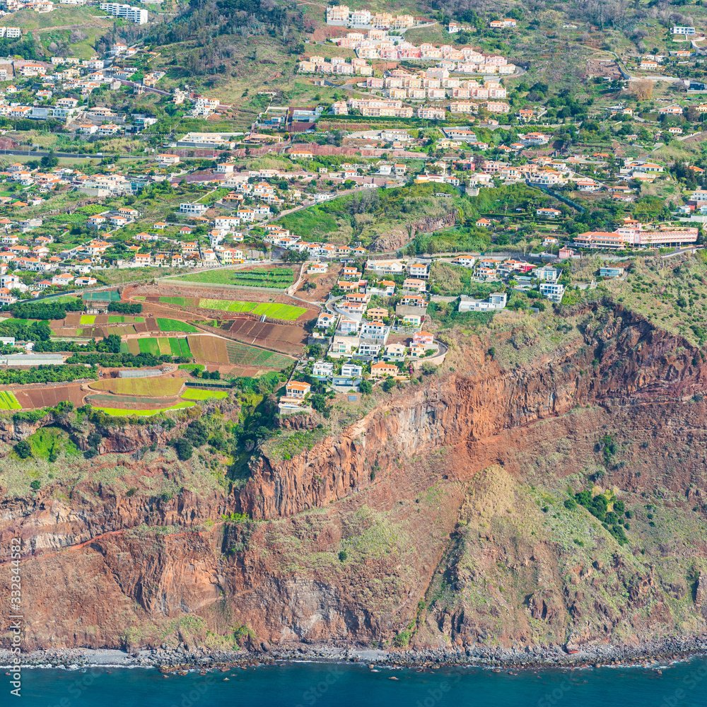 Aerial view of houses on hillside, Madeira