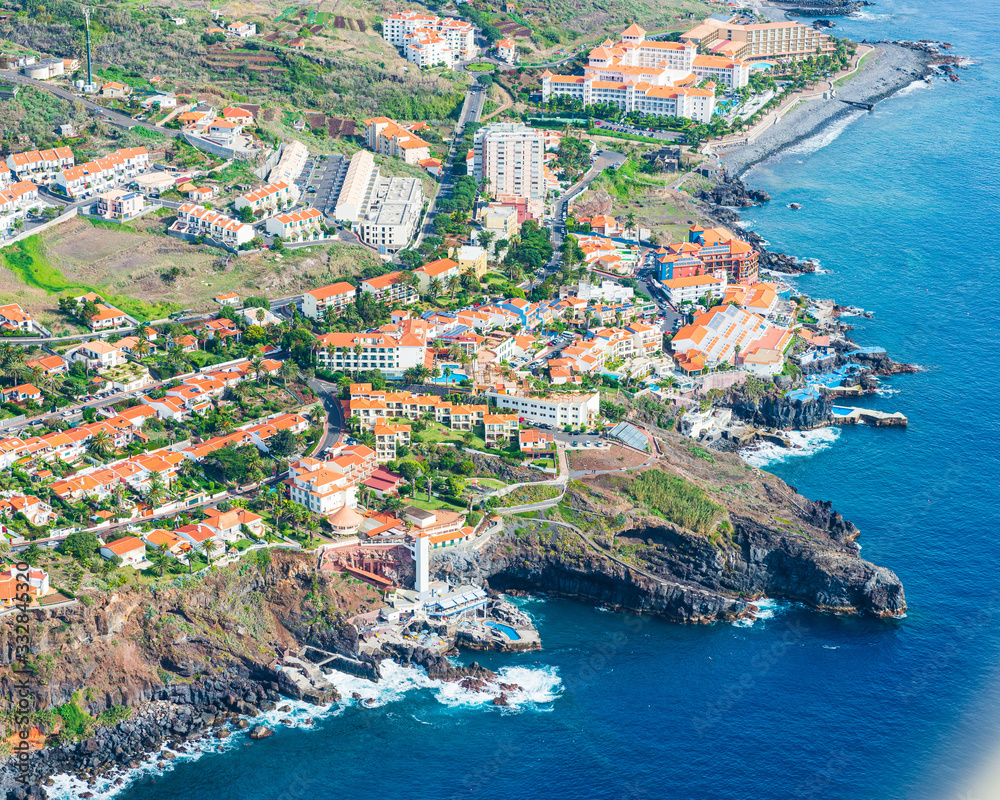 Aerial view of buildings and coastline of Madeira