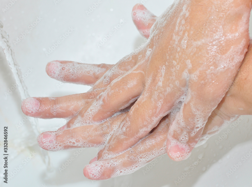 Corona virus pandemic prevention wash hands with soap.Personal hygiene concept.