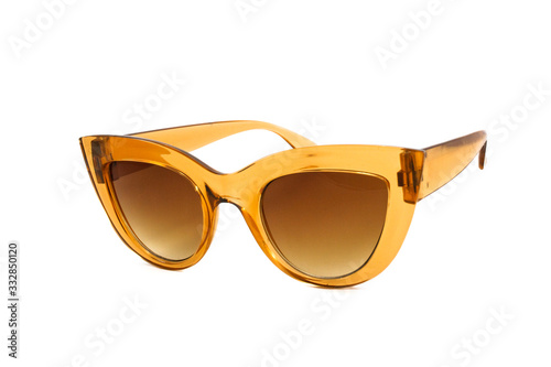 Yellow cat eye sunglasses with thick frame and gradient glass isolated on white background, side view.