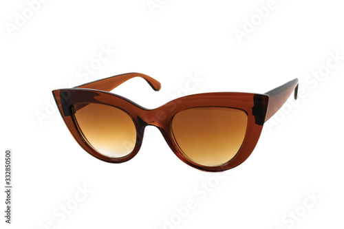 Brown cat eye sunglasses with thick frame and gradient glass isolated on white background, side view.