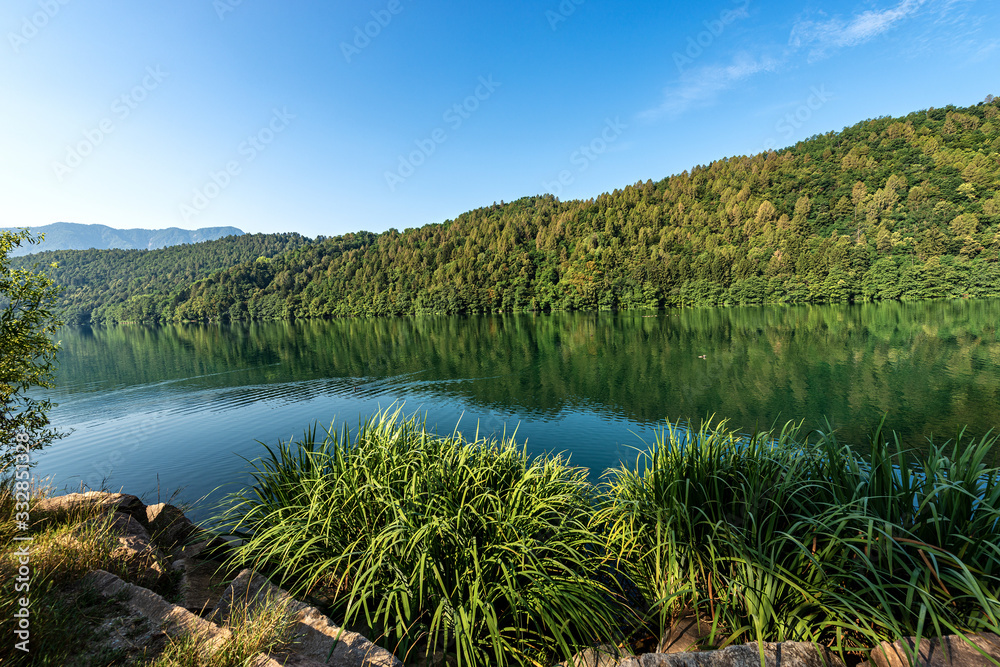 Lago di Levico, small beautiful lake in Italian Alps, Levico Terme town, Trento province, Trentino Alto Adige, Italy, Europe