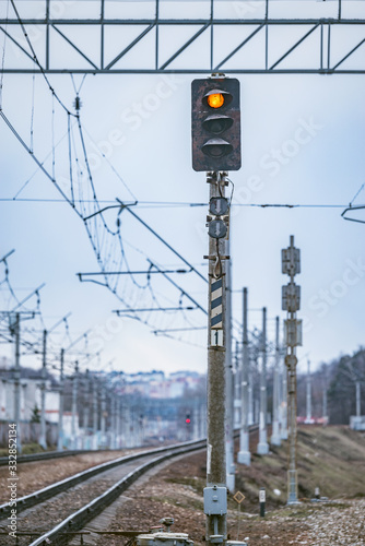 Trafficlight by the railway track.