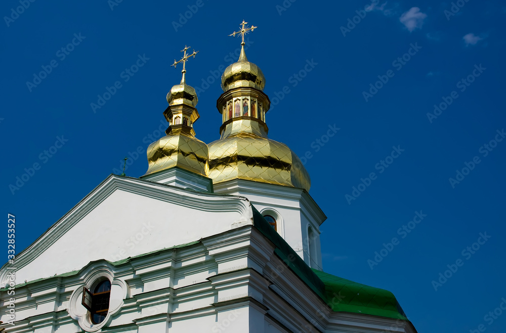 Church with beautiful golden domes against the sky