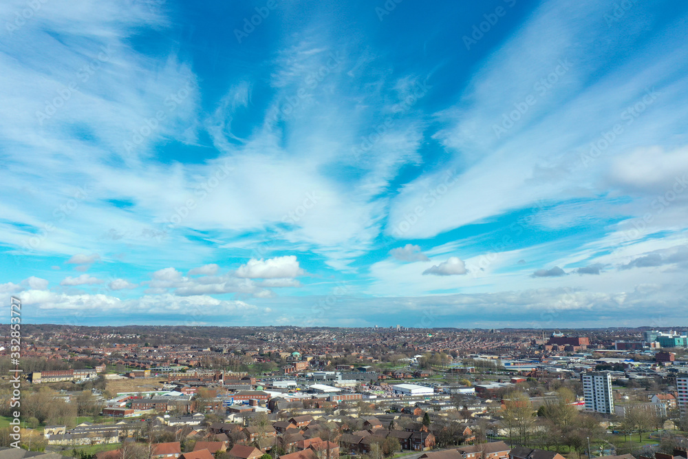 Aerial photo over looking the area of Leeds known as Headingley in West Yorkshire UK, showing a typical British hosing estates and roads taken with a drone on a sunny day Aerial photo over looking the area of Leeds known as Headingley in West Yorkshire UK, showing a typical British hosing estates and roads taken with a drone on a sunny day