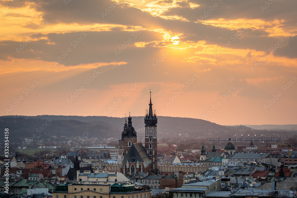 Fototapeta premium View to Cracow - St Mary's Church, Market during sunset