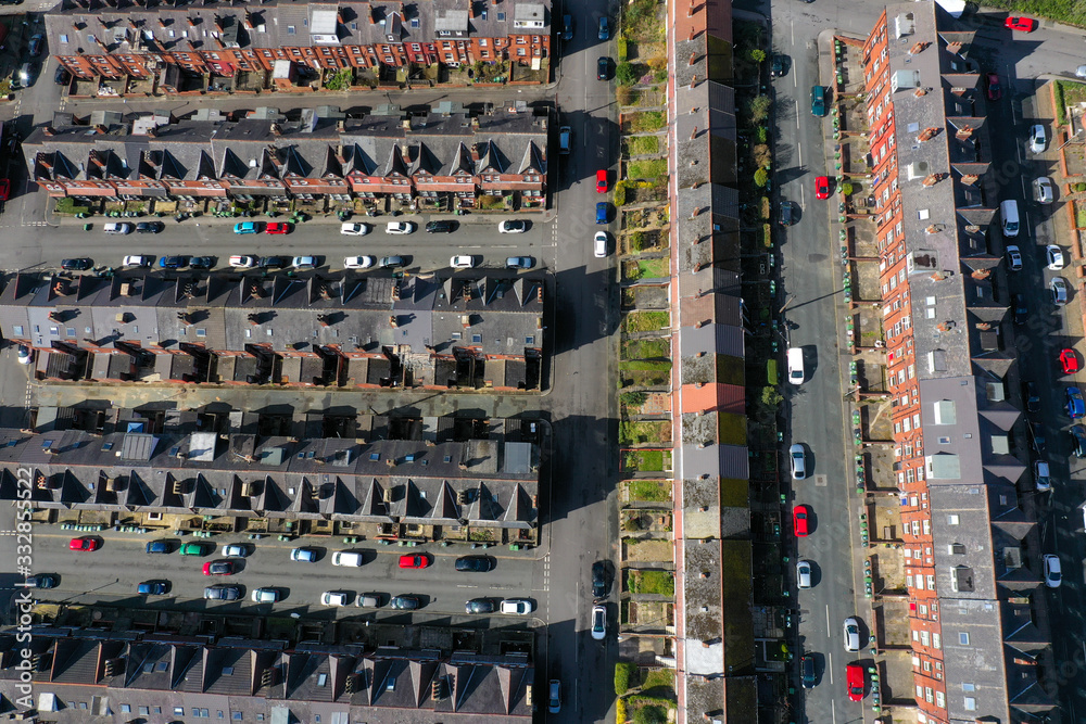 Aerial photo over looking the area of Leeds known as Headingley in West Yorkshire UK, showing a typical British hosing estates and roads taken with a drone on a sunny day