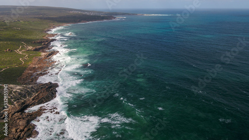 Aerial Drone Images Grace Town waves crashing over Rocks Perth Western Australia 