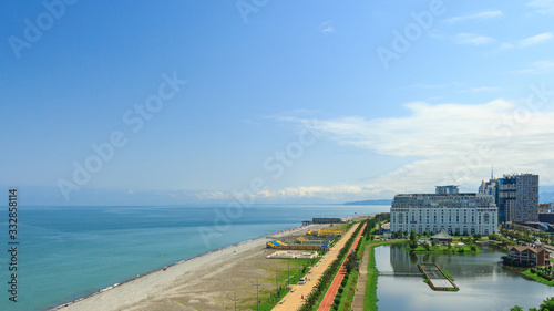 Top view of the promenade, beach, Black Sea coast in Batumi. Georgia attracts many tourists. The concept of a tourist site, the design of a postcard or a calendar, there is a place for text.