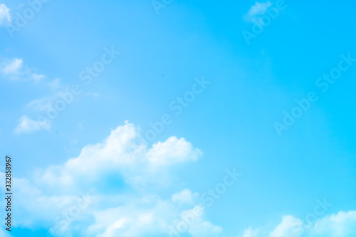 blue sky with beautiful natural white clouds © Ping198