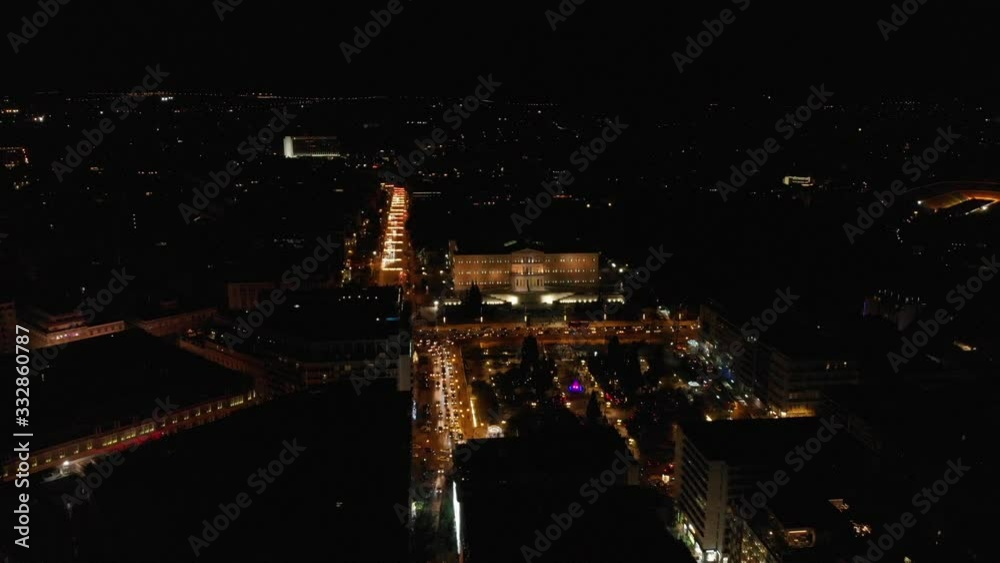 Syntagma square by night aerial drone shot coming closer