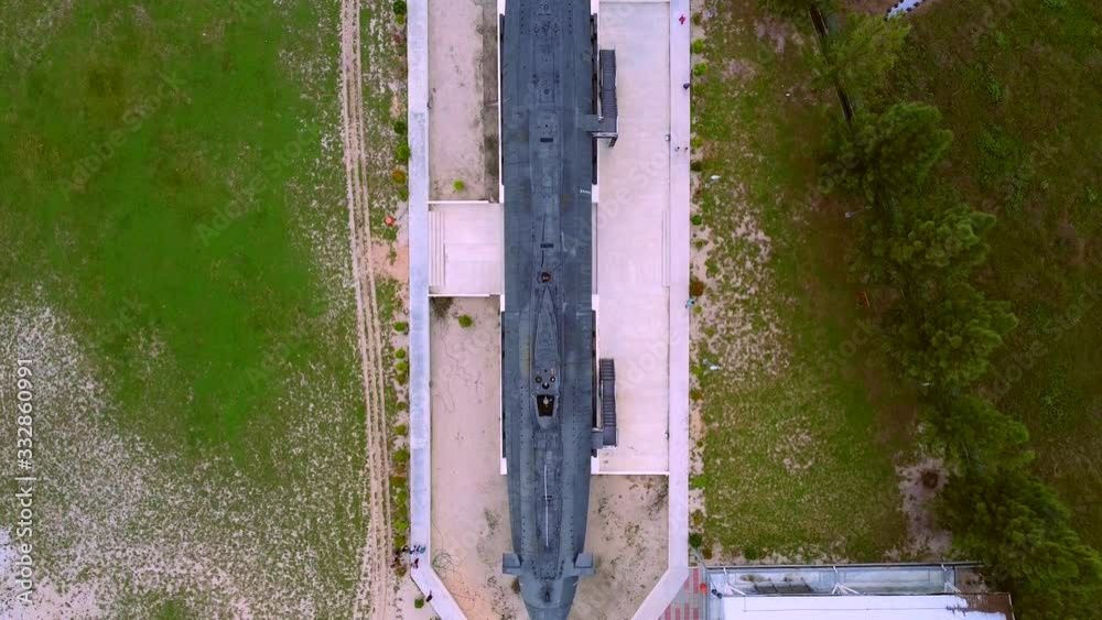 Top View Of The Famous Submarine Museum In Klebang, Malacca, Malaysia On The Grassy Ground With Green Trees - Aerial Shot Top View Of The Famous Submarine Museum In Klebang, Malacca, Malaysia On The Grassy Ground With Green Trees - Aerial Shot