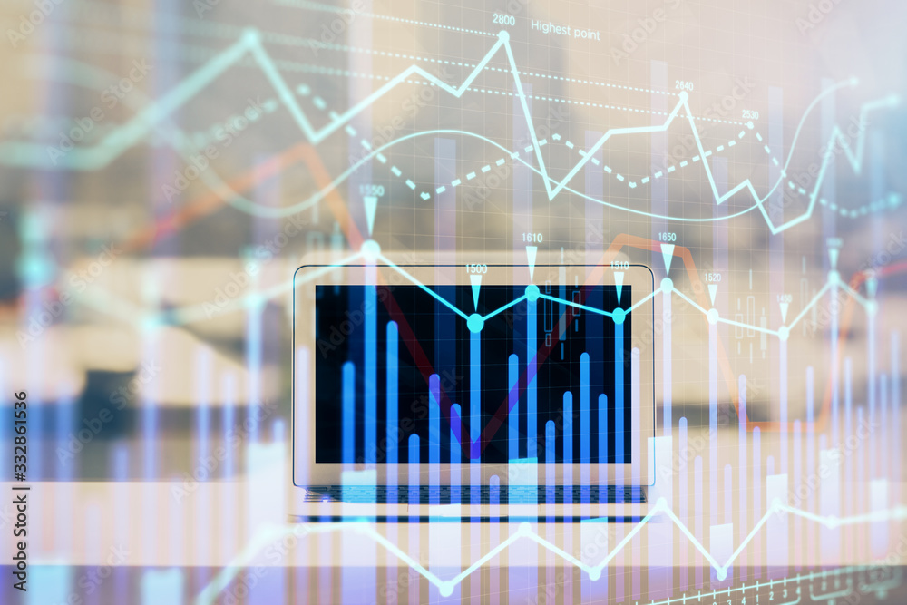 Forex graph hologram on table with computer background. Multi exposure. Concept of financial markets. Forex graph hologram on table with computer background. Multi exposure. Concept of financial markets.
