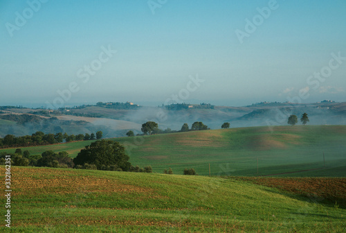 Fototapeta Naklejka Na Ścianę i Meble -  Early foggy morning on Tuscany, countryside, Italy