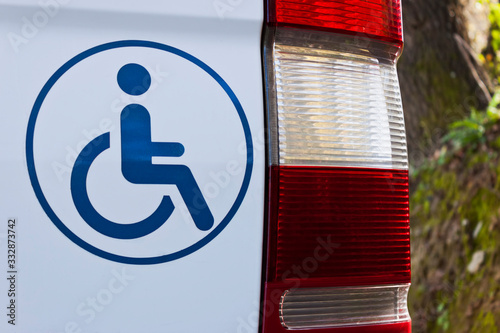 Accessible vehicle sign on white van