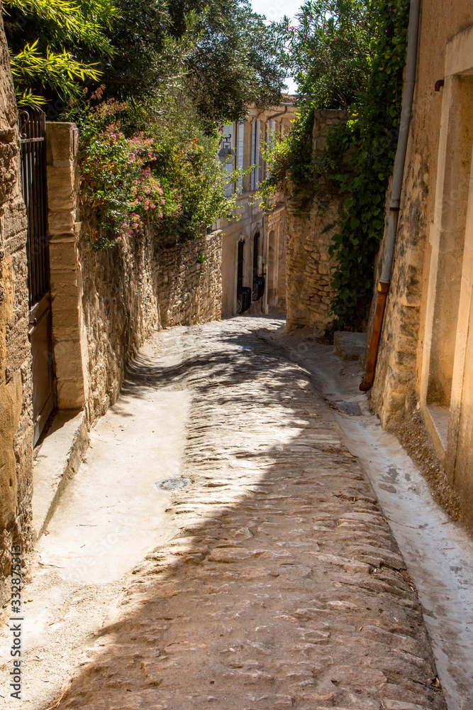 Narrow street in Gordes village in France, Provence