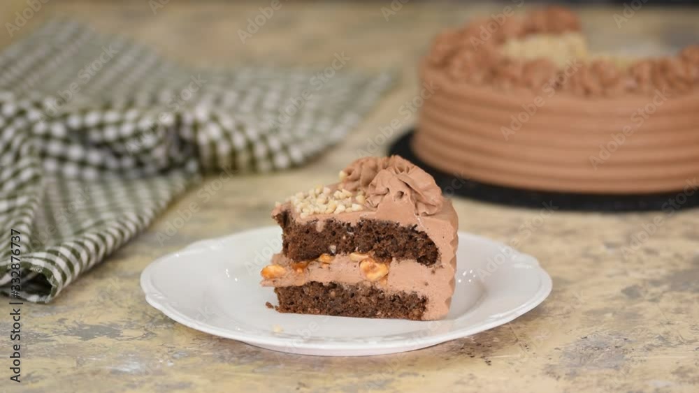 Piece of Delicious Chocolate Cake with nuts and caramel. Piece of Delicious Chocolate Cake with nuts and caramel.