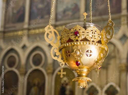 Gold olive lamp used in orthodox church.