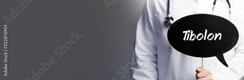 Tibolon. Arzt im Kittel hält Sprechblase hoch. Das Wort Tibolon steht im Schild. Symbol für Krankheit, Gesundheit, Medizin photo