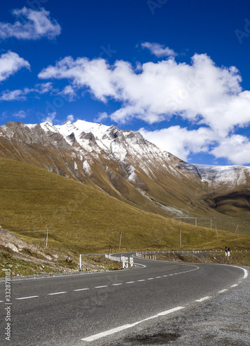 High mountains in Kazbegi district - peaks with snow on it.