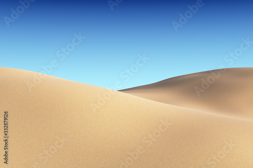 Smooth sand dunes under blue sky