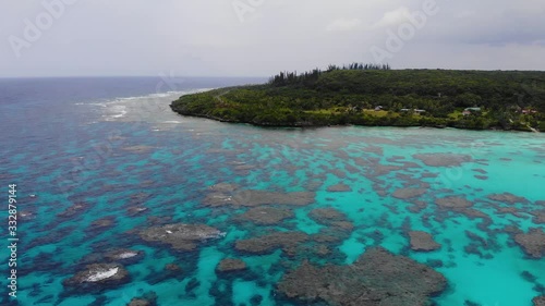 Aerial drone footage of Wadra Bay in Lifou New Caledonia.