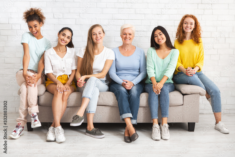 Mutiracial Ladies Of Different Age Sitting On Couch Posing Indoor Mutiracial Ladies Of Different Age Sitting On Couch Posing Indoor