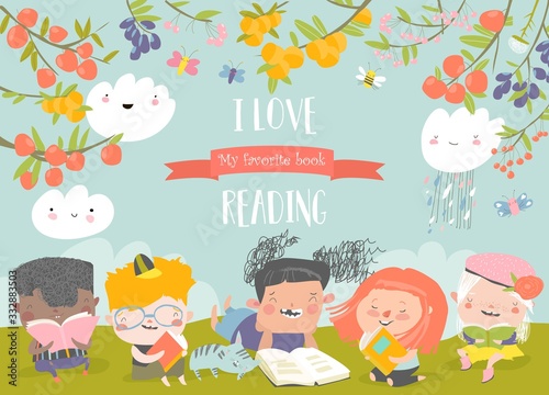 Happy kids reading books on green meadow