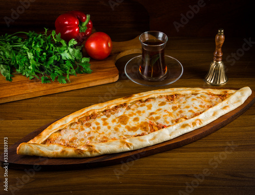 Turkish traditional pita pide cheese and meat pide with cheese turkish cuisine photo