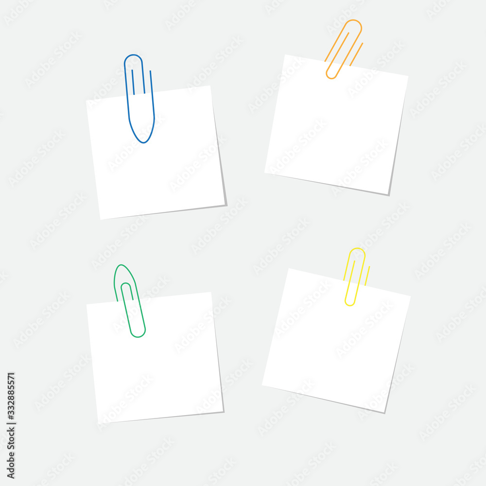 small pieces of paper with colorful paper clips small pieces of paper with colorful paper clips