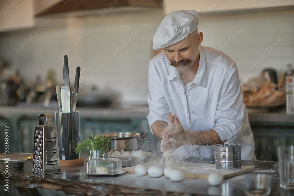french chef in the kitchen preparing food, cooking, haute cuisine, man with mustache french chef in the kitchen preparing food, cooking, haute cuisine, man with mustache