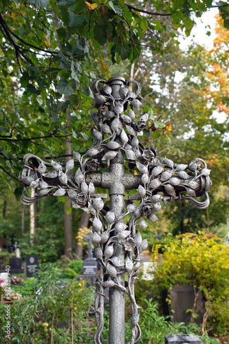 Old metal silver cross, Russian cemetery