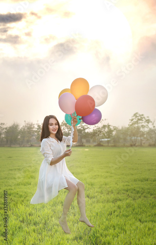 happy pretty woman with balloons