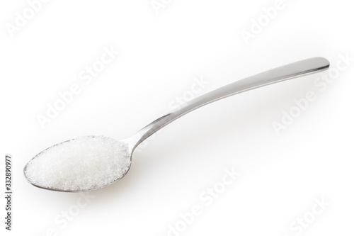 Teaspoon of sugar isolated on white background with clipping path photo