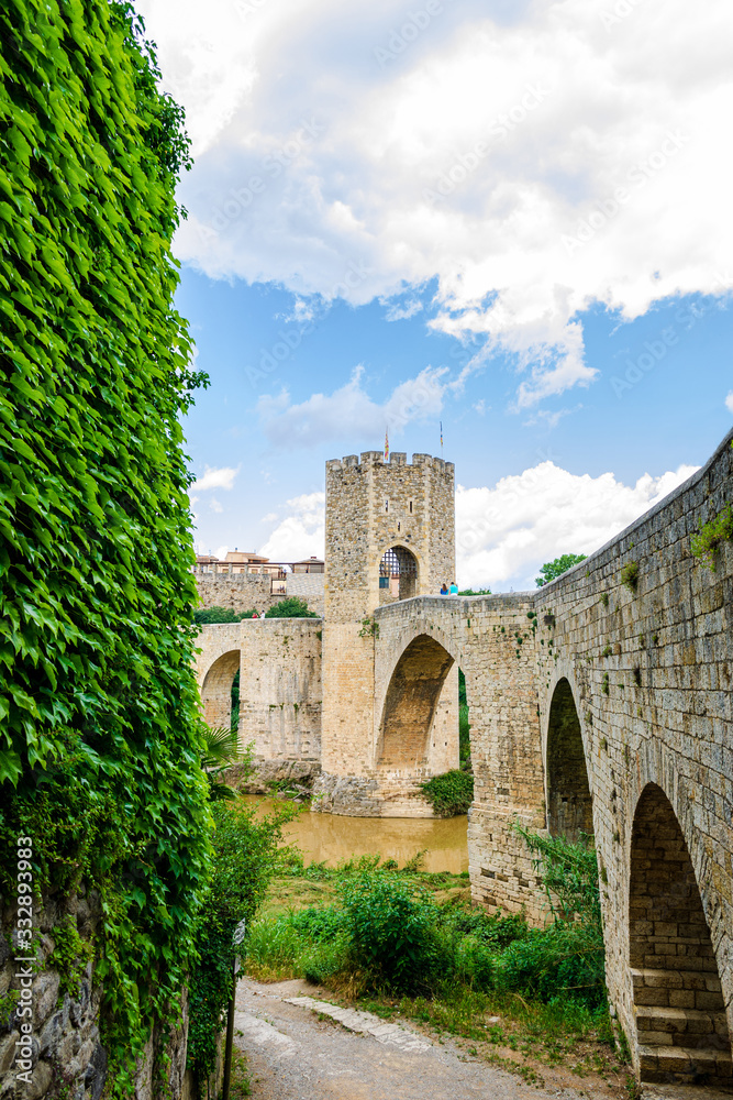 Fototapeta premium Medieval bridge of Besalu. View from north fortificated town. Garrotxa, Girona, Catalonia, Spain